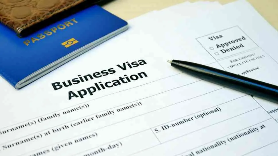 Business Visa Application document with passport