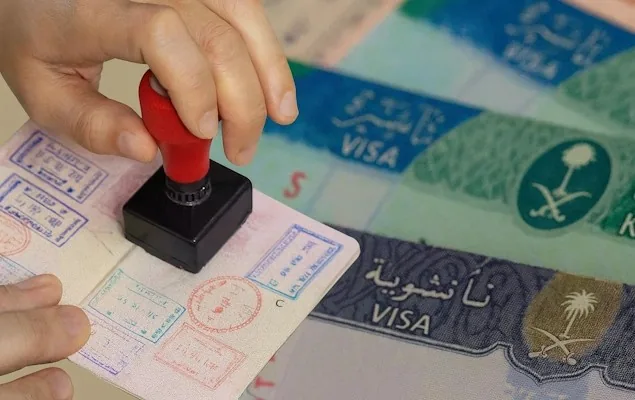 Umrah visa being stamped on passport